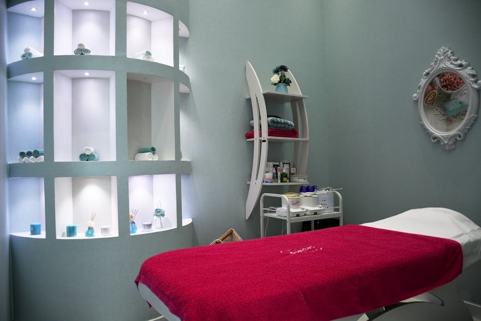 Modern spa room with stylish decor, ambient lighting, and luxurious fittings.
